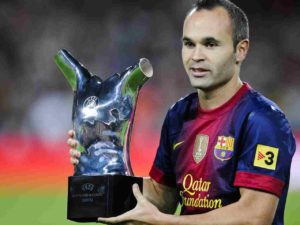 Andres Iniesta with award