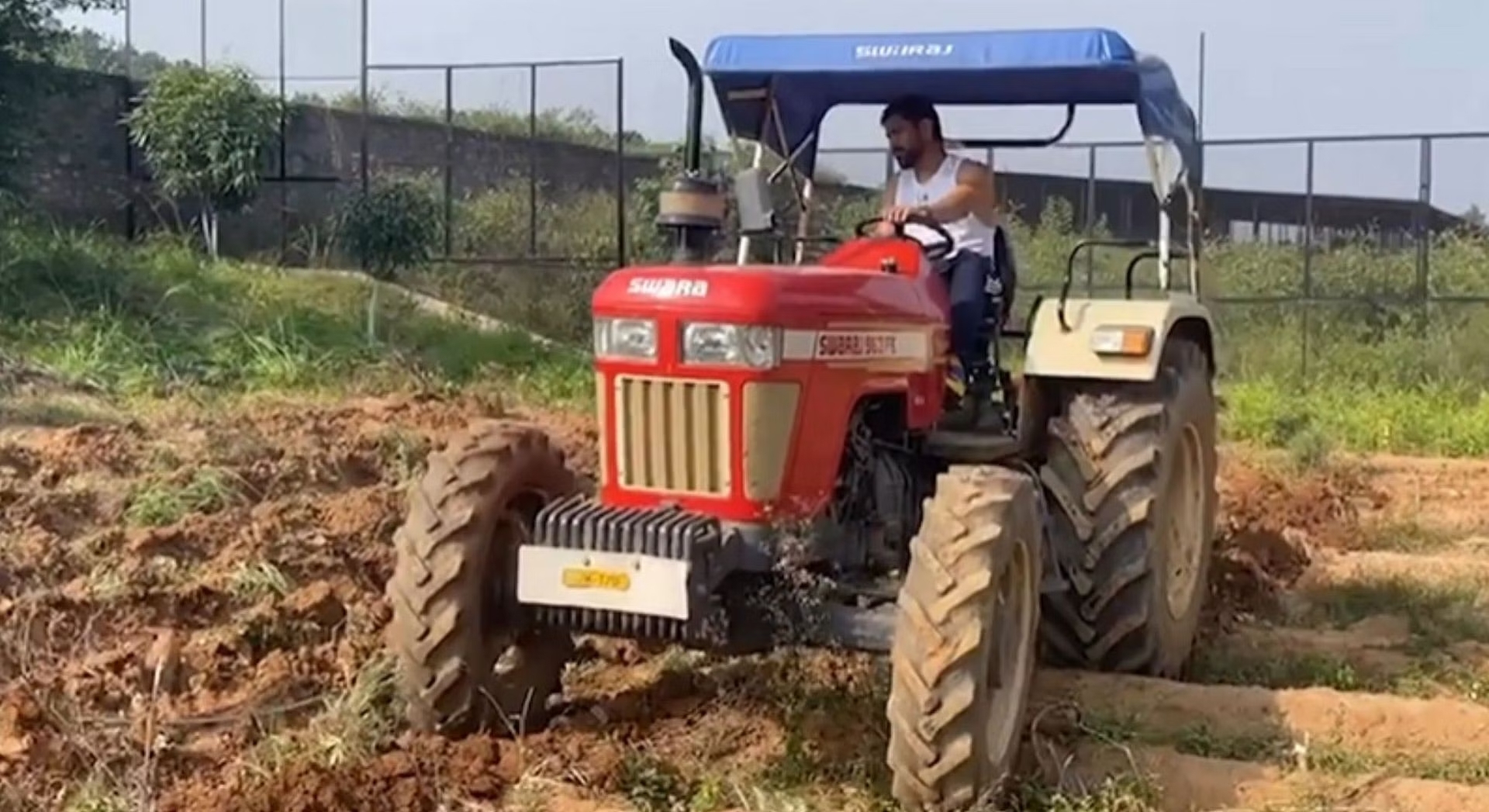 Nice to learn something new” – MS Dhoni drives tractor